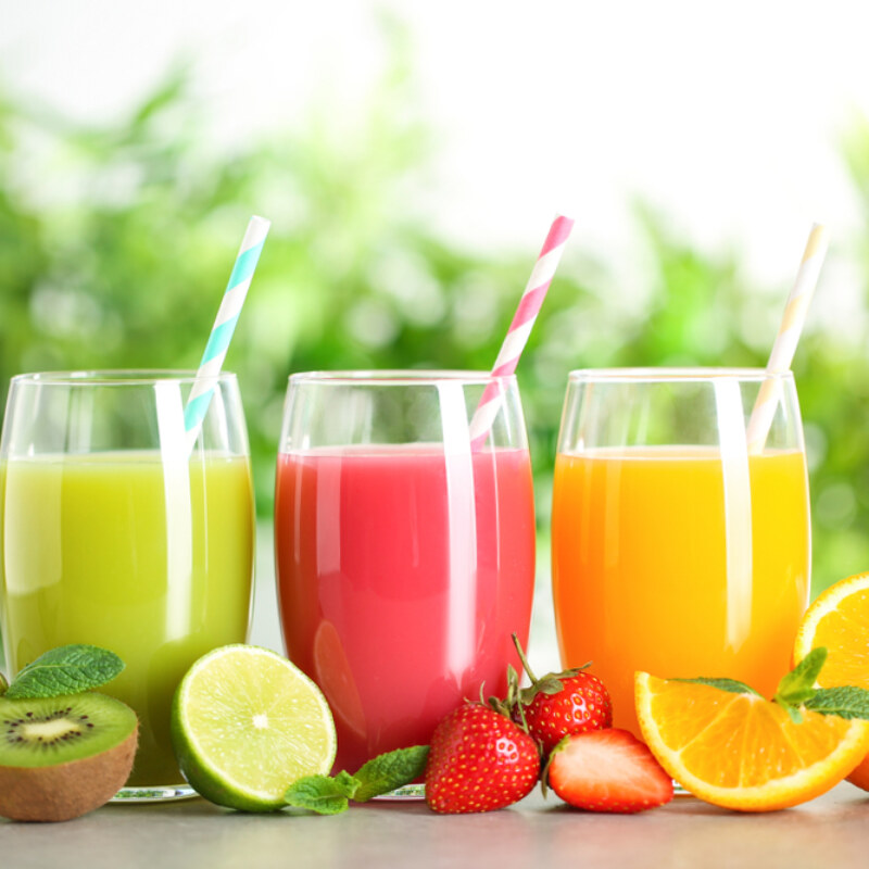 Glasses,Of,Different,Juices,With,Straws,And,Fresh,Fruits,On
