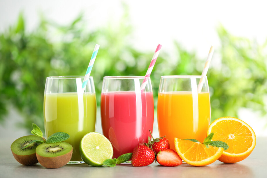 Glasses,Of,Different,Juices,With,Straws,And,Fresh,Fruits,On